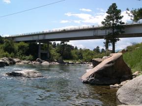 Figure 64. Arkansas River, Rocky Mountains-bridge number 2 downstream from other bridge. Photo. This is looking at a second bridge downstream from the study bridge.