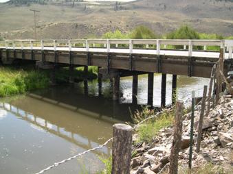 Figure 66. Cochetopa Creek, Rocky Mountains-looking downstream at bridge. Photo. This is looking downstream at the bridge.