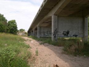 Figure 76. South Fork Solomon River, Great Plains-looking downstream at bridge, photo 2. Photo. This is looking downstream at the bridge. The bridge spans a large part of the flood plain.