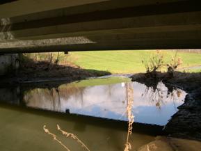 Figure 103. Unnamed creek (N 28), Interior Low Plateau-downstream under bridge. Photo. This is looking downstream under the bridge. 