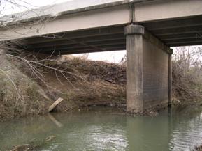 Figure 111. Little Skin Creek, Ozark-Ouachita Highlands-looking downstream at       bridge (left). Photo. This is looking downstream at the bridge toward the left bank. 