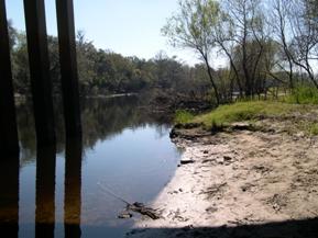 Figure 131. Peace River, Atlantic Coastal Plain-downstream under bridge, right bank. Photo. This is looking downstream under the bridge along the right bank. The bank material is primarily sand. 