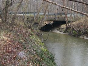 Figure 140. Stocketts Run, Atlantic Coastal Plain-looking upstream at bridge. Photo. This is looking upstream at the bridge. It is well-aligned, and banks are stable.