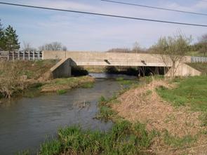 Figure 232. Buffalo Run, Valley and Ridge-looking upstream at bridge. Photo. This is looking upstream at the bridge and a moderate alignment.