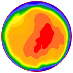 Figure 60. Image. Velocity profile at the outlet for Q divided by A subscript o equals 75 centimeters per second (30 inches per second). This is one in a series of images in appendix C showing velocity profiles in the outlet pipe from access hole experiments. The images have a spectrum of colors with blue indicating the lowest velocity, red the highest, and cyan, green, yellow, and orange spanning the moderate velocities in between. This particular image is the first of four for the flow rate of 75 centimeters per second.  The image shows a single oblong moderate size red area of highest velocity just below and to the right of the pipe's center point. A medium velocity area is roughly circular and occupies all but the very outside edge of the pipe.