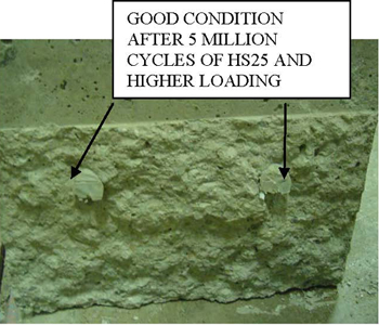This photo shows the portion of slab number 1 that was separated from the other by cutting the fiber reinforced polymer dowel at the joint between two slabs. The dowel-concrete interface is in good shape with no visible micro cracks after 5 million cycles of HS25 and higher loading. 