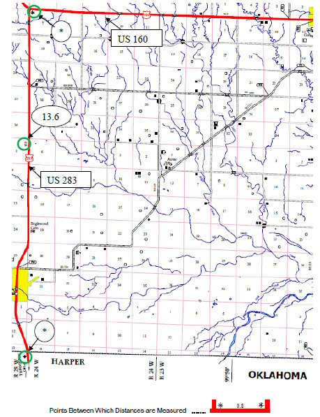 This figure shows a screenshot of a map of Clark County, KS. Green circles along route US 283 have been added to the screenshot to help identify the asterisk symbols at the beginning and end of the segment used in the evaluation and to identify the distance indication for the segment (13.6 mi).