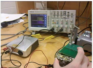 This photo shows the same specimen from figure 71 with wires leading from the receiver to the reader.