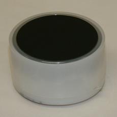 This photo shows an inverted x-ray fluorescence spectroscopy  cup after it has been filled with asphalt. 