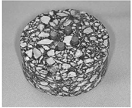 Figure 10 of protocol P07 provides a picture of a typical asphalt core after the gage points have been mounted.  The core is shown on one side with the four gage points mounted at the center of the cylinder on that side.