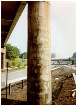Figure 37. Photo. Cracking on the patched areas on one of the columns of the Campus Loop Bridge in Albany, NY, during the first evaluation in 1995. This photograph shows cracking on the patched areas on one of the columns of the Campus Loop Bridge in Albany, NY, during the first evaluation in 1995.