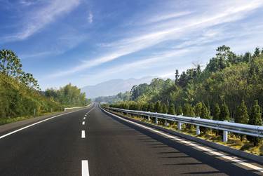 Photo. Scenic two-lane highway. Credit: © hxdyl/Shutterstock.com.