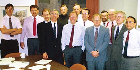 Photo. Participants in a meeting of the SHRP-LTPP International Coordinators.