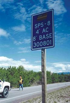 Photo. SHRP test section identification sign along a highway for section 300801, SPS-8, with 4 inches asphalt concrete over an 8-inch base