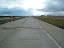 Figure 7.9. Photo. Pavement with load cells.