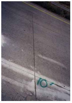 The figure consists of 11 photographs of typical joint sections for each test section of the Winnemucca test site. Photograph A-1-A shows control section 3, C 3; photo A-1-B shows the lithium hydroxide section 2, L 2; photo A-1-C shows silane section 2, S 2; photo A-1-D shows methacrylate section 2, M 2; photo A-1-E shows silane number 2, S A 1; photo A-1-F shows linseed oil section 1, L O 1; photo A-1-G shows control section 2, C 2; photo A-1-H shows silane section 1, S 1; photo A-1-I shows lithium hydroxide section 1, L 1; photo A-1-J shows control section 1, C 1; and photo A-1-K shows methacrylate section 1, M 1.