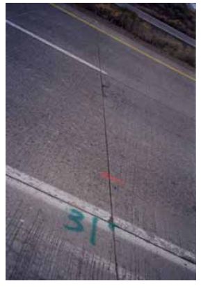 The figure consists of 11 photographs of typical joint sections for each test section of the Winnemucca test site. Photograph A-1-A shows control section 3, C 3; photo A-1-B shows the lithium hydroxide section 2, L 2; photo A-1-C shows silane section 2, S 2; photo A-1-D shows methacrylate section 2, M 2; photo A-1-E shows silane number 2, S A 1; photo A-1-F shows linseed oil section 1, L O 1; photo A-1-G shows control section 2, C 2; photo A-1-H shows silane section 1, S 1; photo A-1-I shows lithium hydroxide section 1, L 1; photo A-1-J shows control section 1, C 1; and photo A-1-K shows methacrylate section 1, M 1.