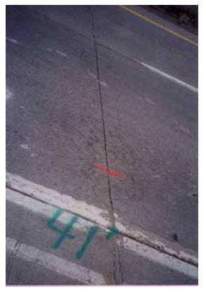 The figure consists of 11 photographs of typical joint sections for each test section of the Winnemucca test site. Photograph A-1-A shows control section 3, C 3; photo A-1-B shows the lithium hydroxide section 2, L 2; photo A-1-C shows silane section 2, S 2; photo A-1-D shows methacrylate section 2, M 2; photo A-1-E shows silane number 2, S A 1; photo A-1-F shows linseed oil section 1, L O 1; photo A-1-G shows control section 2, C 2; photo A-1-H shows silane section 1, S 1; photo A-1-I shows lithium hydroxide section 1, L 1; photo A-1-J shows control section 1, C 1; and photo A-1-K shows methacrylate section 1, M 1.