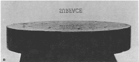 The same surface as in figure 42 is viewed at about a 5 degree incident angle and toward a light source. The clear reflection of a distant object or image is an indication of the flatness of the lapped surface