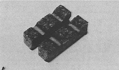 Photo shows two samples with ridges of a wearing surface.