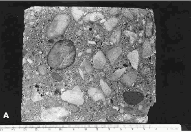 Rounded to sub-angular quartz gravel coarse aggregate and sand fine aggregate. By visual inspection of the naked eye, the paste occupies about one-quarter of the total surface area.