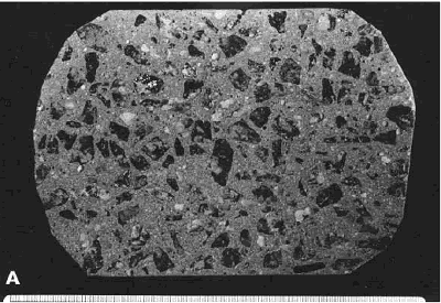 The photo shows the surface of a concrete slice with an estimated maximum aggregate size of 13 millimeters. No larger size aggregate is present. 