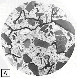 This view is of a smoothly lapped surface with ink marked microcracks generally going in random directions.