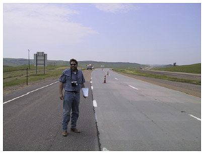 Figure 24.  Photo. Experimental Pavement on U.S. I-90 near Oacoma, SD. This photo shows three lanes of the roadway.