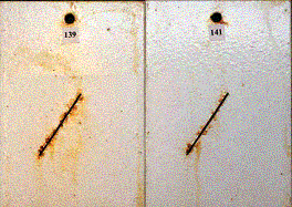Figure 6. b - Panel pictures. [Coating conditions of system 2 after exposures. A. 3,000-hour test A, b. 3,000-hour test B  C. 2-year outdoor exposure]  This figure shows the coating conditions of system 2 (zinc-rich moisture-cured urethane system) after three tests. No surface failure was observed in all cases. They all exhibited a small amount of creepage at the scribe.  However, test B induced a higher amount of scribe creepage than that by test A and outdoor exposure.