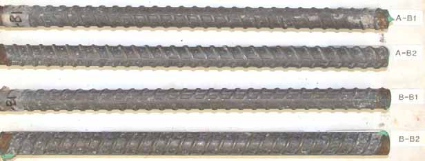 Figure 47. Slab #1 after autopsy. Photo. After autopsy, the cleaned bottom mat straight black bars show corrosion on the ends but otherwise are uniformly gray.