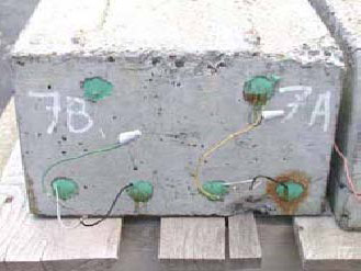 Figure 63. Slab #7 front, rear, and top views with specifications. Photos. (A) Slab number 7 front view shows the 7B label on the left and 7A on the right. The top and bottom right bars show corrosion. Wires connect the top and bottom bars of 7B and the same for 7A. 