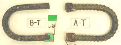 Figure 67. Slab #8 extracted rebars condition. Photo. Before autopsy, the top mat bent ECRs exhibit corrosion. 