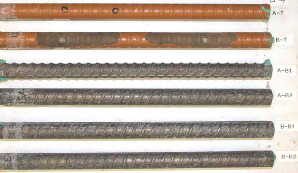 Figure 89. Slab #15 after autopsy. Photo. After autopsy, a top mat ECR (A-T) is unchanged without coating disbondment, but the other ECR (B-T) is moderately delaminated (more than 30 percent) with corroded substrate. The cleaned bottom mat black bars look good without pitting corrosion.