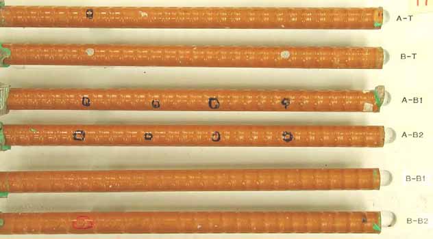 Figure 94. Slab #17 extracted rebars condition. Photo. Before autopsy, all top mat and bottom mat ECRs look good without any noticeable coating deterioration other than the intentional coating defects. 