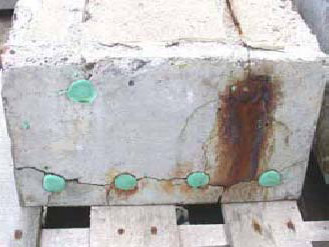 Figure 99. Slab #19 front, rear, and top views with specifications. Photos. (B) The rear view is unlabeled showing corrosion on the right bar bleeding down to the lower level. Cracks connect the bottom bars and radiate out from the bars. 