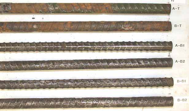 Figure 101. Slab #19 after autopsy. Photo. After autopsy, both of the top mat ECRs (A-T and B-T) are almost completely delaminated with major substrate corrosion. The cleaned bottom mat black bars exhibit severe corrosion damage.