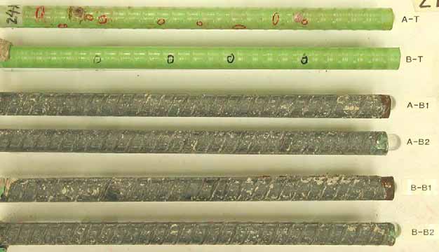 Figure 115. Slab #24 extracted rebars condition. Photo. Before autopsy, the top mat two straight ECRs (A-T and B-T) look good with intentional coating defects circled. The bottom mat four black bars exhibit corrosion-free condition. 