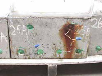Figure 117. Slab #25 front, rear, and top views with specifications. Photos. (A) Slab number 25 front view shows the 25A label on the left and 25B on the right. All bars show minor corrosion but the top right bar is completely corroded and stains the concrete around it down between the lower level of bars. The concrete on the lower level has some staining. Wires connect the top and bottom bars of 25B; the same is true for 25A. 