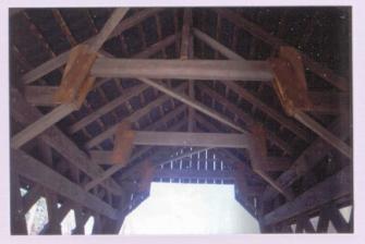 This inside view of the bridge roof shows an unconventional right angle bracing system that may have contributed to the bridge's collapse.