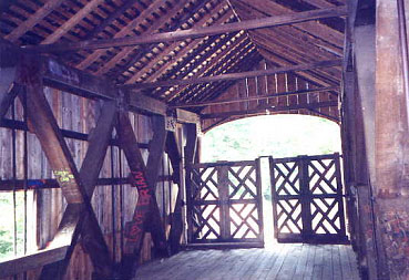 The interior view of this bridge shows the unusual timber gates that restrict traffic to bicycles and pedestrians
