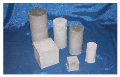This photo shows the four sizes of cylinders and the two sizes of cubes that were tested within this research program