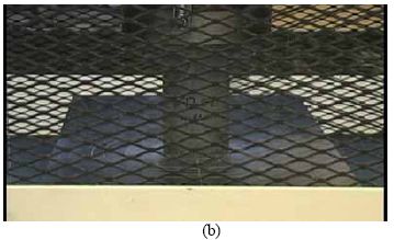 This collection of four photos shows the rapid progression of failure in a steam treated U H P C cylinder containing no fiber reinforcement. The cylinder is intact in photos (a) and (b). The cylinder is shattering in photo (c) and is mostly missing from the photograph in (d).