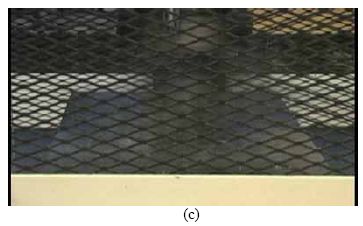 This collection of four photos shows the rapid progression of failure in a steam treated U H P C cylinder containing no fiber reinforcement. The cylinder is intact in photos (a) and (b). The cylinder is shattering in photo (c) and is mostly missing from the photograph in (d).