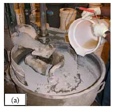 This series of five photos graphically depicts the stages in the mixing of U H P C as observed for all of the batches of concrete cast for this study. (a) shows the dry constituent materials in the pan mixer as the water is being added. (b) shows the U H P C in the mixer as the H R W A is added. (c) shows the U H P C before its conversion into a viscous paste. (d) shows the U H P C at the time of fiber addition. (e) shows the U H P C after mixing is complete.