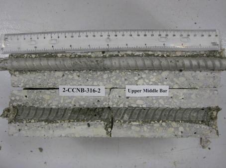 Figure 92. Photo. Top C bar and bar trace of specimen 2-CCNB-316-2 subsequent to dissection. This is a photograph of a top C bar and bar trace of specimen 2-CCNB-316-2 subsequent to dissection. No corrosion is apparent.