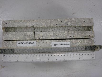 Figure 100. Photo. Top C bar and bar trace of specimen 6-BCAT-304-2 subsequent to dissection. This is a photograph of a top C bar and bar trace of specimen 6-BCAT-304-2 subsequent to dissection. No corrosion is apparent.