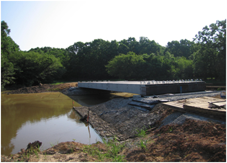 Photo. Concrete box bridge on GRS abutment in Ouachita wildlife refuge.  Click here for more information.