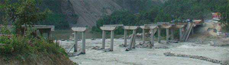 Photo. Damage Scenario of 10-Span Bridge Under Construction During the Earthquake. Click here for more information.