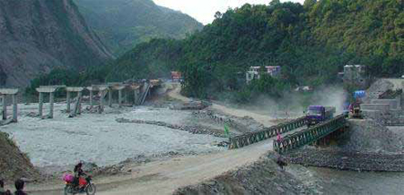 Photo. Overview of Temporary Bridge Construction. Click here for more information.