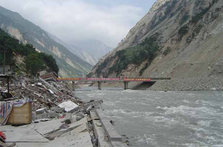 Photo. Mingjiang Bridge and Other Structural Damage in Yingxiu Village. Click here for more information.